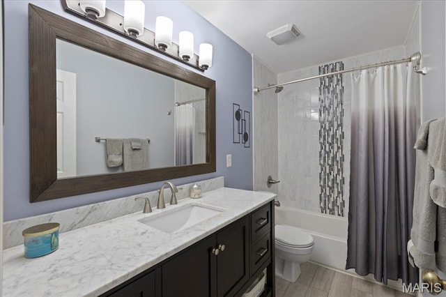 1001 Windstream Dr Unit 32, Saint Peters, MO 63376 - bathroom with vanity, toilet, shower / bathtub combination with curtain, and wood finished floors