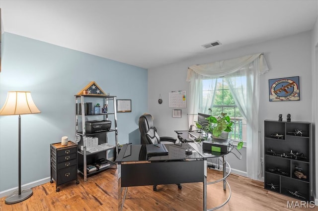 1001 Windstream Dr Unit 32, Saint Peters, MO 63376 - home office featuring light wood-style floors and baseboards