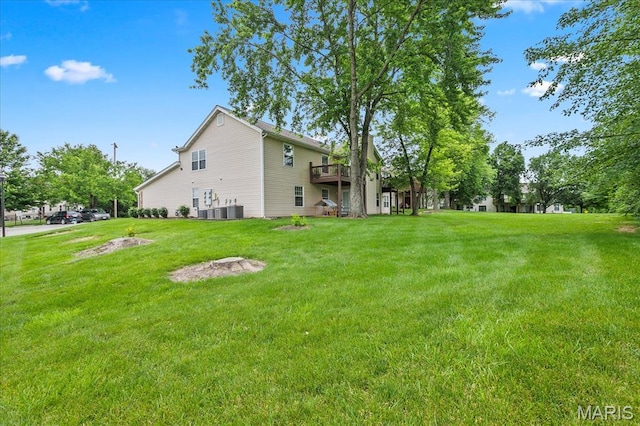 1001 Windstream Dr Unit 32, Saint Peters, MO 63376 - view of green lawn with a wooden deck and central AC unit