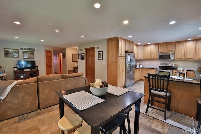 306 Lakewood Dr, Hillsboro, IL 62049 - dining space featuring recessed lighting and light stone finish flooring