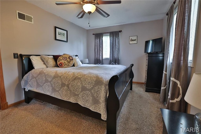 306 Lakewood Dr, Hillsboro, IL 62049 - bedroom with carpet floors, baseboards, and a ceiling fan