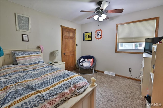 306 Lakewood Dr, Hillsboro, IL 62049 - bedroom featuring carpet, baseboards, and ceiling fan