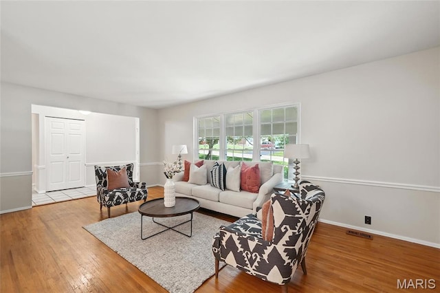 1214 Iron Warrior Ln, Ballwin, MO 63011 - living room featuring wood finished floors and baseboards