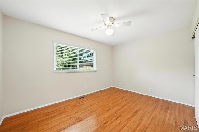 1214 Iron Warrior Ln, Ballwin, MO 63011 - spare room with light wood-style floors and ceiling fan