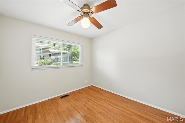 1214 Iron Warrior Ln, Ballwin, MO 63011 - spare room with light wood-type flooring and a ceiling fan