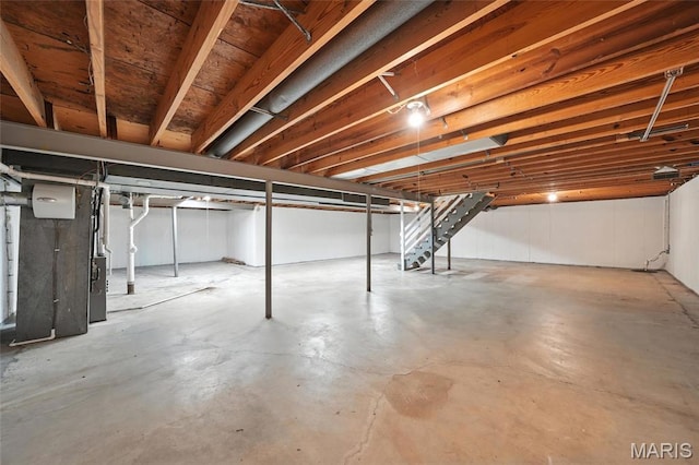 1214 Iron Warrior Ln, Ballwin, MO 63011 - unfinished below grade area with heating unit and stairs