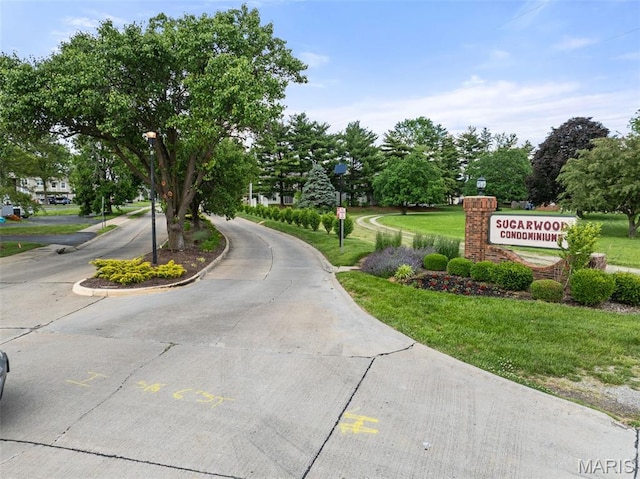 621 Sugar Trail Ct Unit 4, Saint Peters, MO 63376 - view of concrete street featuring street lighting and curbs