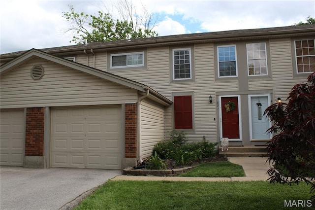 621 Sugar Trail Ct Unit 4, Saint Peters, MO 63376 - townhome / multi-family property with asphalt driveway, brick siding, and a garage