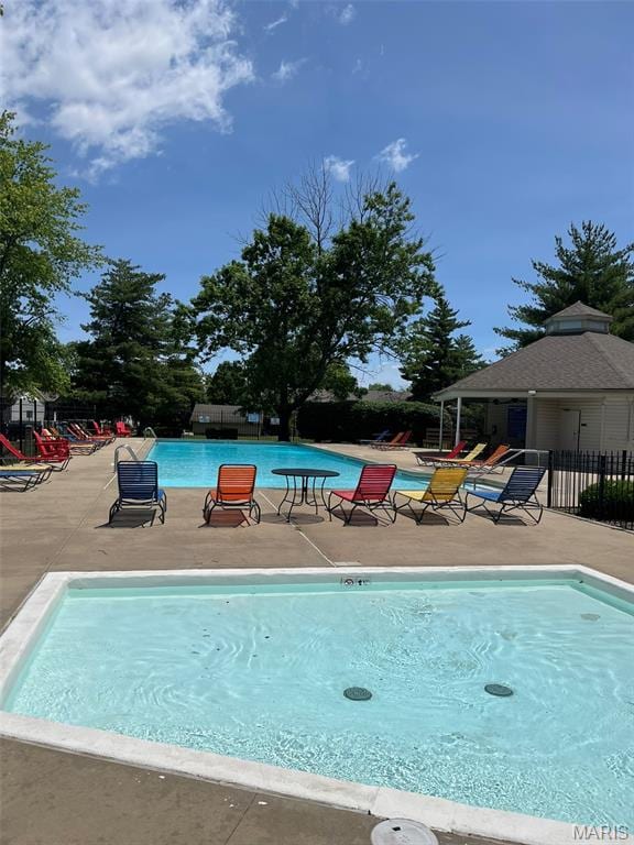 621 Sugar Trail Ct Unit 4, Saint Peters, MO 63376 - community pool featuring a patio