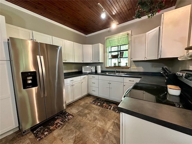 12185 Oak Meadow Dr, Rolla, MO 65401 - kitchen with stainless steel appliances, wooden ceiling, a sink, dark countertops, and white cabinetry