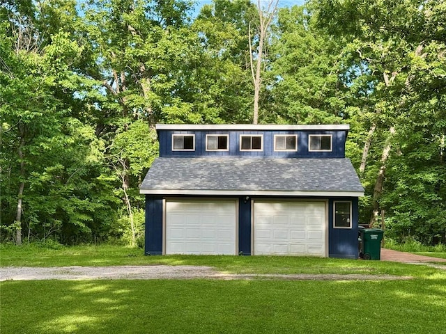 12185 Oak Meadow Dr, Rolla, MO 65401 - garage with view of scattered trees and a detached garage