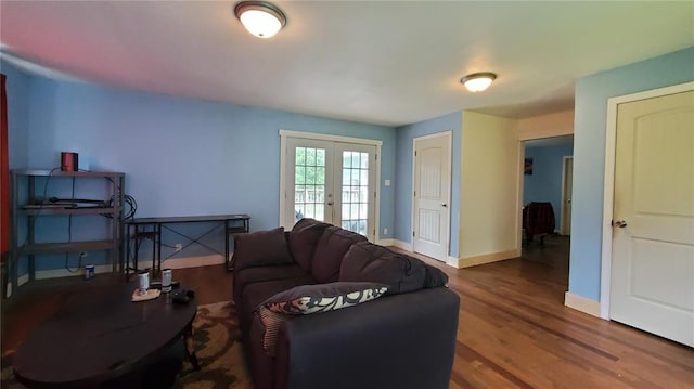 315 County Road 4170, Salem, MO 65560 - living area featuring french doors, wood finished floors, and baseboards