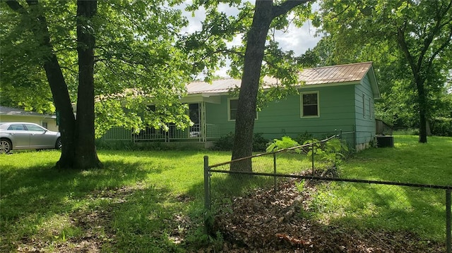 315 County Road 4170, Salem, MO 65560 - view of property exterior with metal roof and central AC