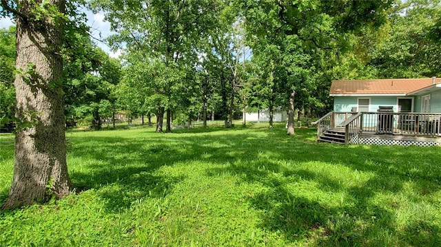 315 County Road 4170, Salem, MO 65560 - view of grassy yard featuring a deck