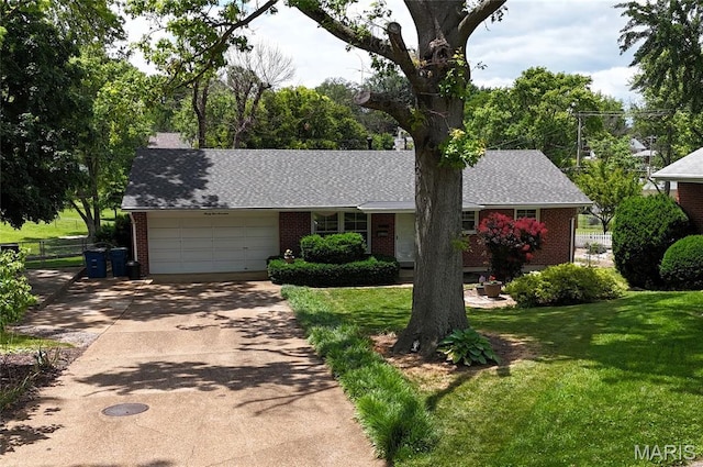9117 Tiber Ct, Affton, MO 63123 - view of front of home featuring brick siding, driveway, a garage, and roof with shingles