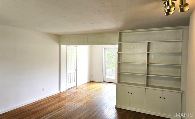 9117 Tiber Ct, Affton, MO 63123 - unfurnished bedroom featuring access to outside and dark wood-style flooring