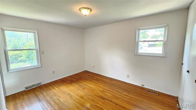 9117 Tiber Ct, Affton, MO 63123 - empty room featuring light wood-style floors