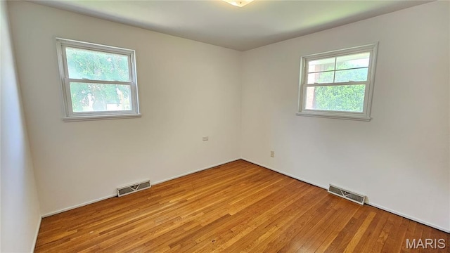 9117 Tiber Ct, Affton, MO 63123 - spare room with light wood-type flooring
