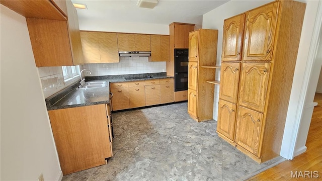 9117 Tiber Ct, Affton, MO 63123 - kitchen featuring black appliances, dark countertops, under cabinet range hood, tasteful backsplash, and open shelves