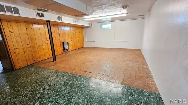 9117 Tiber Ct, Affton, MO 63123 - below grade area with tile patterned floors and wooden walls