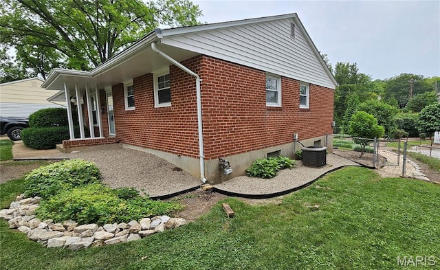 9117 Tiber Ct, Affton, MO 63123 - view of side of home featuring brick siding and a central air condition unit