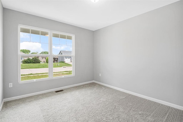 1448 Guilford Pl, Troy, IL 62294 - carpeted empty room with baseboards and plenty of natural light
