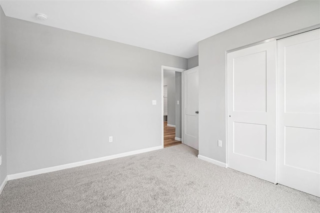 1448 Guilford Pl, Troy, IL 62294 - unfurnished bedroom with carpet floors, baseboards, and a closet