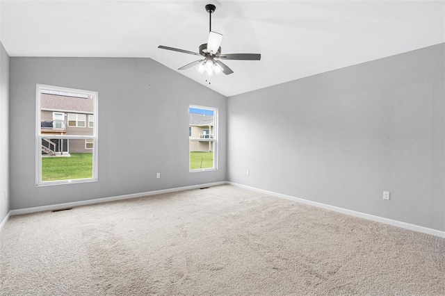 1448 Guilford Pl, Troy, IL 62294 - carpeted empty room with lofted ceiling, baseboards, and a ceiling fan
