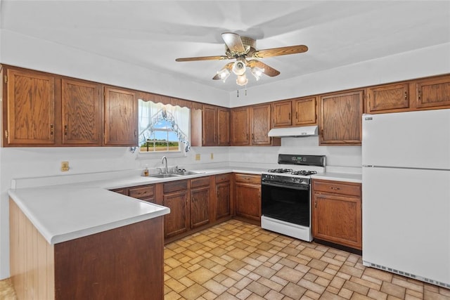 8800 Country Ln, Troy, IL 62294 - kitchen featuring white appliances, under cabinet range hood, a sink, light countertops, and ceiling fan