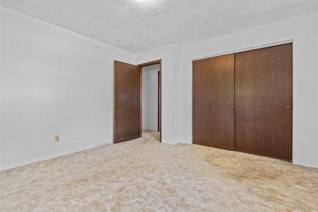 8800 Country Ln, Troy, IL 62294 - unfurnished bedroom featuring a closet and carpet floors