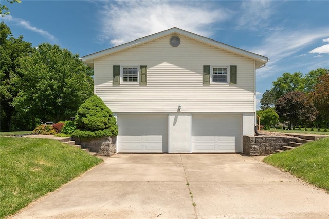 8800 Country Ln, Troy, IL 62294 - view of home's exterior featuring an attached garage and concrete driveway