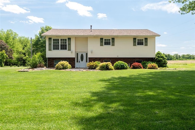 8800 Country Ln, Troy, IL 62294 - bi-level home with a front lawn and an attached garage