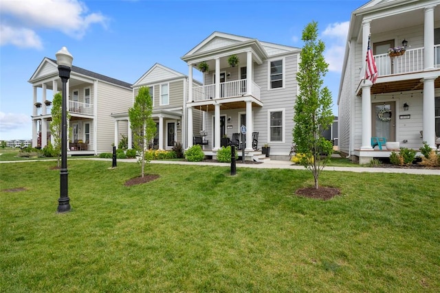 369 Tiber Pl, Saint Charles, MO 63301 - greek revival inspired property with a balcony and a front yard