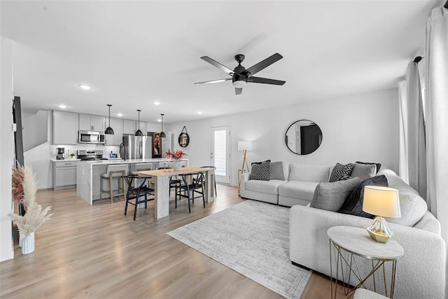 369 Tiber Pl, Saint Charles, MO 63301 - living area featuring recessed lighting, ceiling fan, and light wood-type flooring