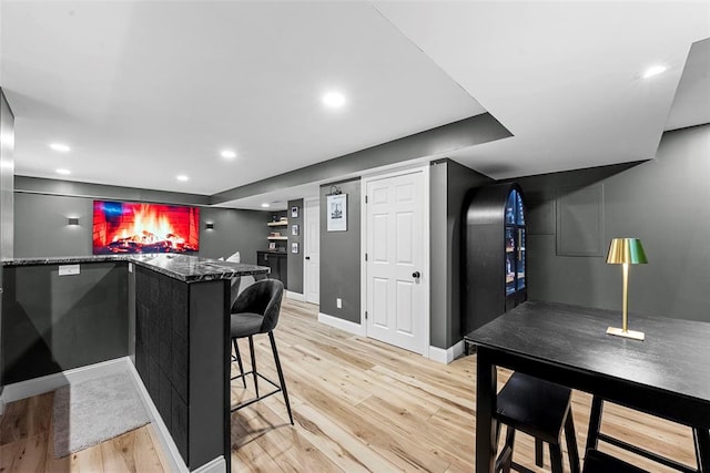 369 Tiber Pl, Saint Charles, MO 63301 - indoor dry bar with light wood-style flooring, baseboards, and recessed lighting