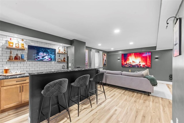 369 Tiber Pl, Saint Charles, MO 63301 - cinema featuring wet bar, light wood-style flooring, recessed lighting, and baseboards