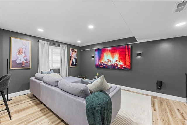 369 Tiber Pl, Saint Charles, MO 63301 - home theater room featuring baseboards, wood finished floors, and recessed lighting