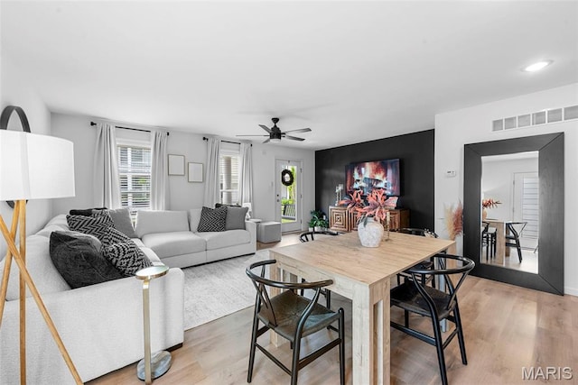 369 Tiber Pl, Saint Charles, MO 63301 - dining area featuring a ceiling fan and light wood-style flooring