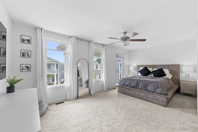 369 Tiber Pl, Saint Charles, MO 63301 - carpeted bedroom with access to outside, ceiling fan, and baseboards