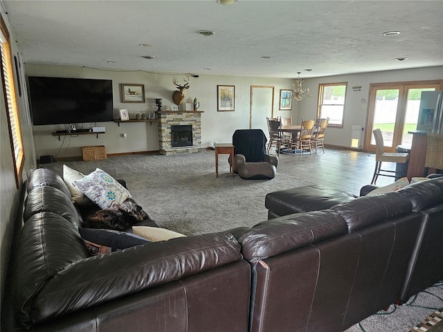 202 Jeremiah, Willisville, IL 62997 - carpeted living area with baseboards and a stone fireplace