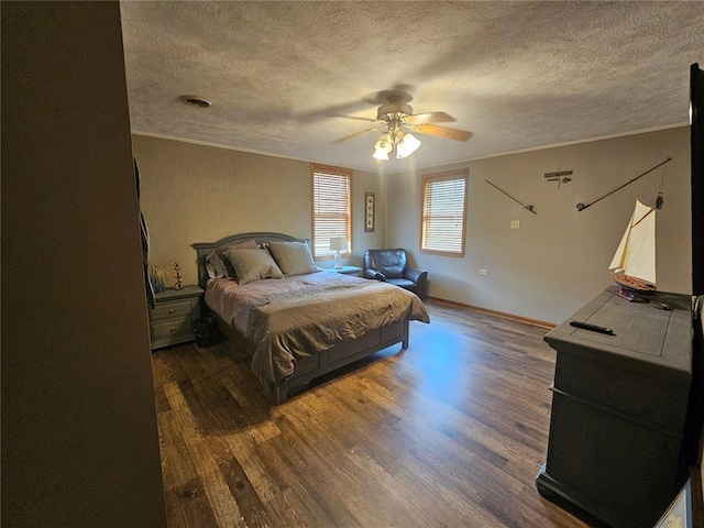 202 Jeremiah, Willisville, IL 62997 - bedroom featuring wood finished floors, a textured ceiling, ornamental molding, ceiling fan, and baseboards