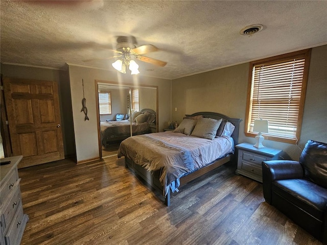 202 Jeremiah, Willisville, IL 62997 - bedroom with dark wood-style flooring, a textured ceiling, ornamental molding, and ceiling fan