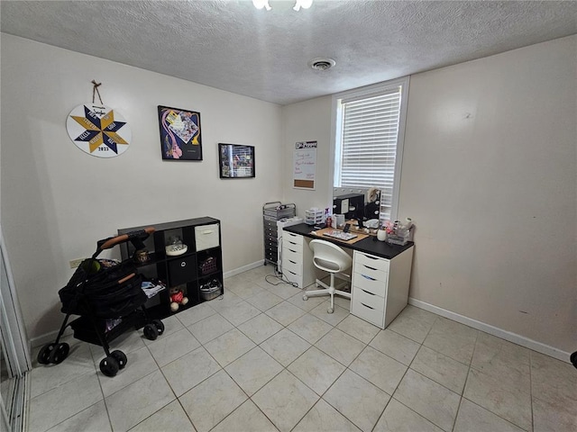 202 Jeremiah, Willisville, IL 62997 - office with a textured ceiling, baseboards, and light tile patterned flooring