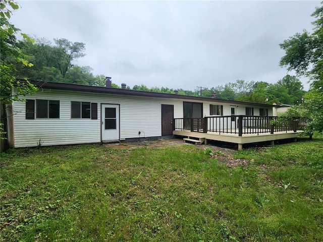 1505 Dale St, Van Buren, MO 63965 - back of house with a wooden deck and a yard