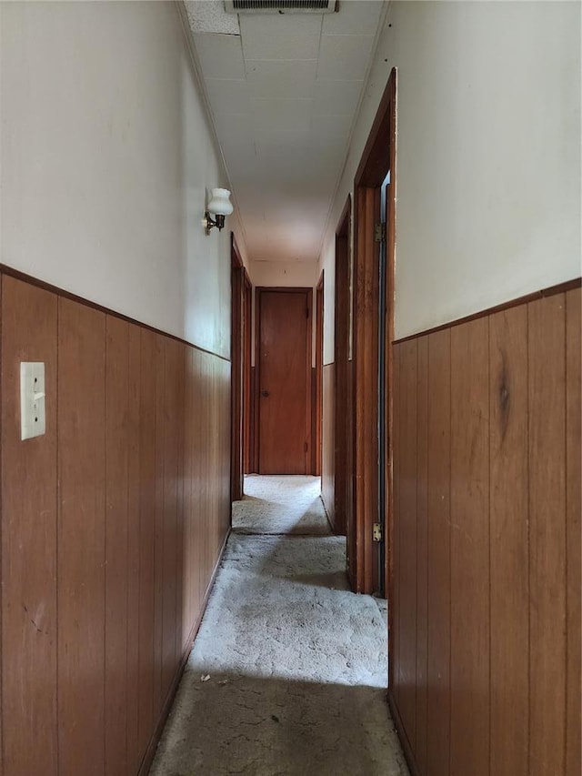 1505 Dale St, Van Buren, MO 63965 - hallway featuring wood walls and wainscoting
