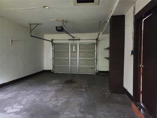 1505 Dale St, Van Buren, MO 63965 - garage featuring a garage door opener and baseboards