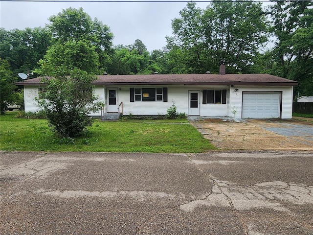 1505 Dale St, Van Buren, MO 63965 - ranch-style home featuring an attached garage, a front lawn, entry steps, a chimney, and concrete driveway