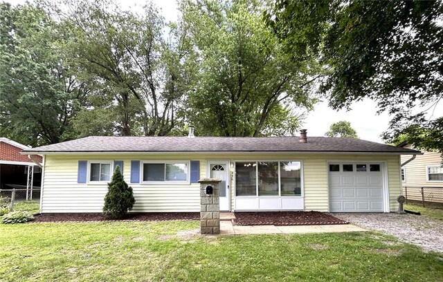 436 S 5th St, Caseyville, IL 62232 - ranch-style house featuring a garage and driveway