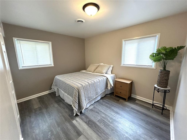 436 S 5th St, Caseyville, IL 62232 - bedroom featuring wood finished floors and baseboards