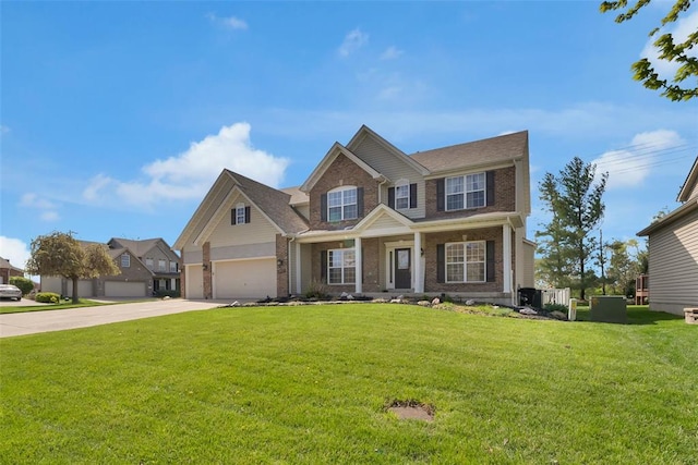 1002 Brook Mont Dr, Ofallon, MO 63366 - view of front of property with brick siding, concrete driveway, a front yard, and covered porch